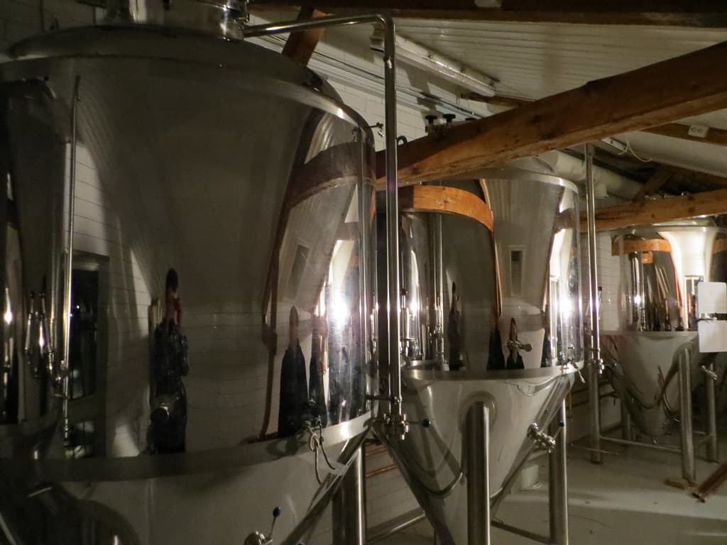 Stainless steel process tanks in a food or beverage plant