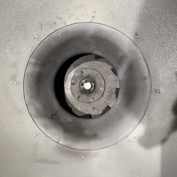 Industrial paint-system exhaust fan after dry ice blasting.